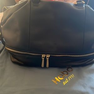 Like new HOBO bag, with dust protection bag.